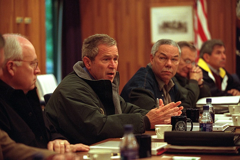 Pres. George W. Bush confers with his National Security Council on Saturday, 9/15/01, four days after the 9/11 attacks. 