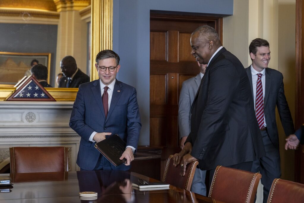 House Speaker Mike Johnson (R-La.) meets with Secretary of Defense Lloyd Austin in November 2023. In April 2024, Johnson ended months of stalemate on foreign aid for Ukraine. He turned to House Democrats to push through the aid package, despite the objections of many in his own party.