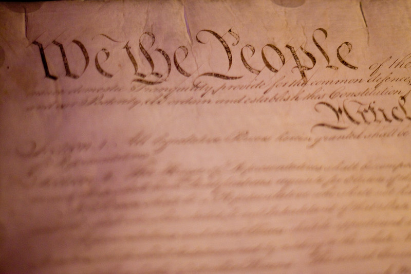 Faded copy of the U.S. Constitution, outlining the protections of government.