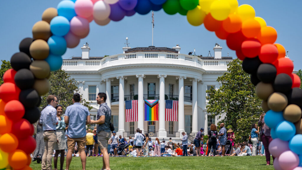 Pride celebration at the White House in June 2023. Image shows the White House with U.S. and Pride flags.